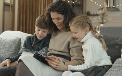 mom reading Bible with children